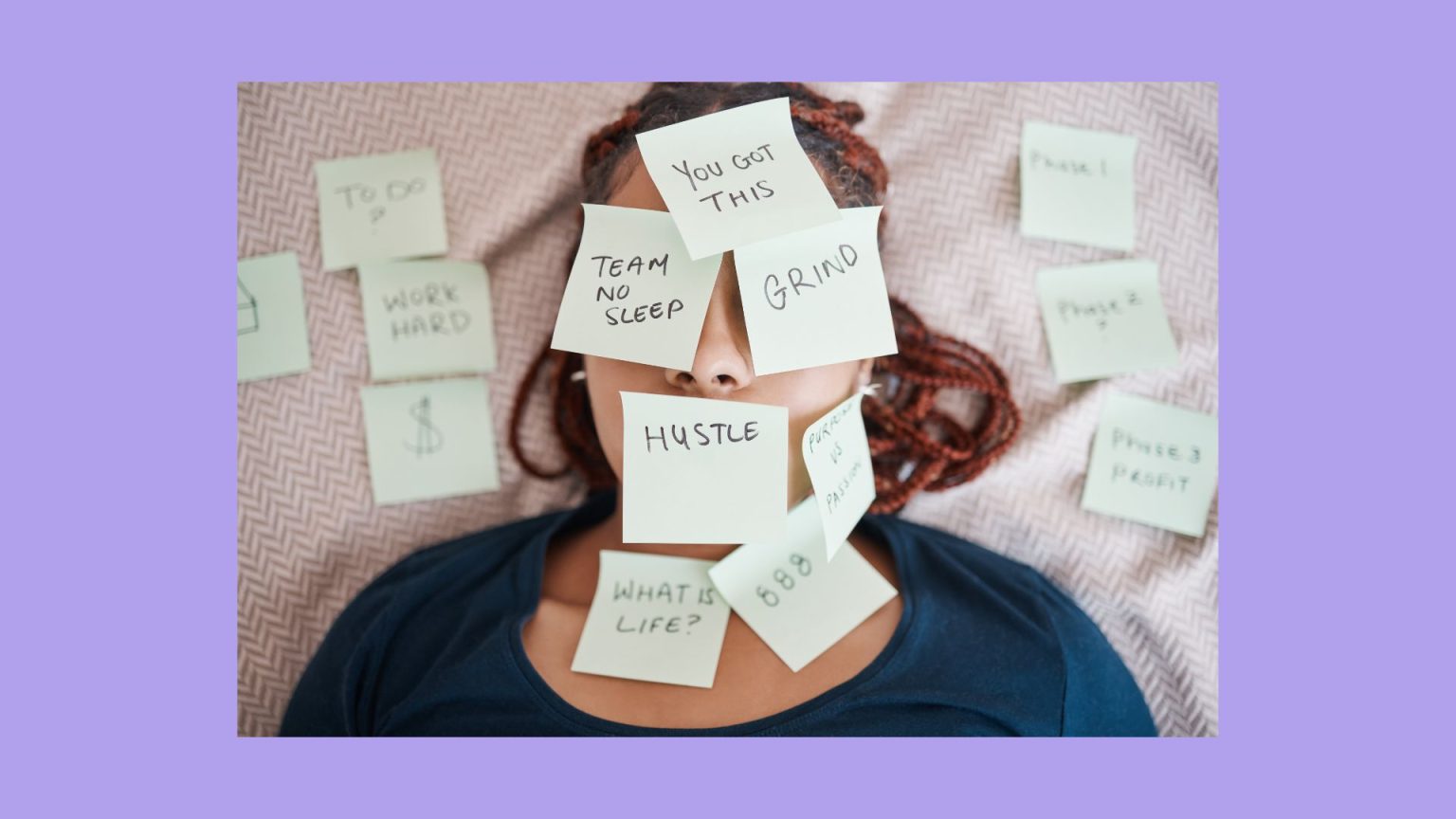 woman laying down covered with sticky notes - some of encouragement and others of tasks to do